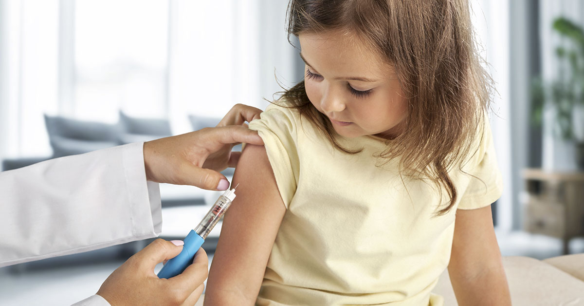 child receiving vaccine
