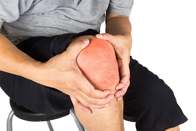 man with inflammed knee