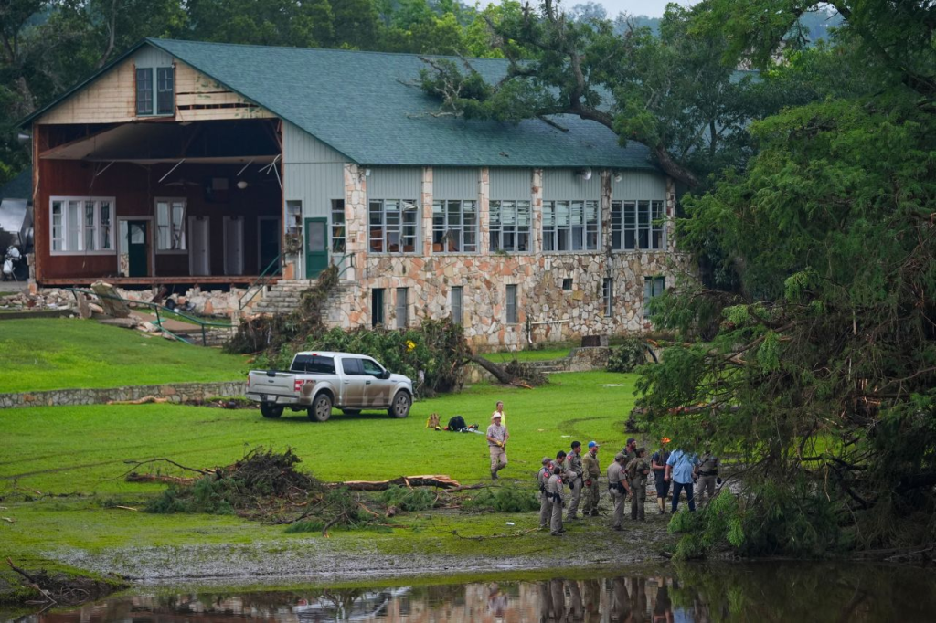 Officials search on the grounds of Camp Mystic