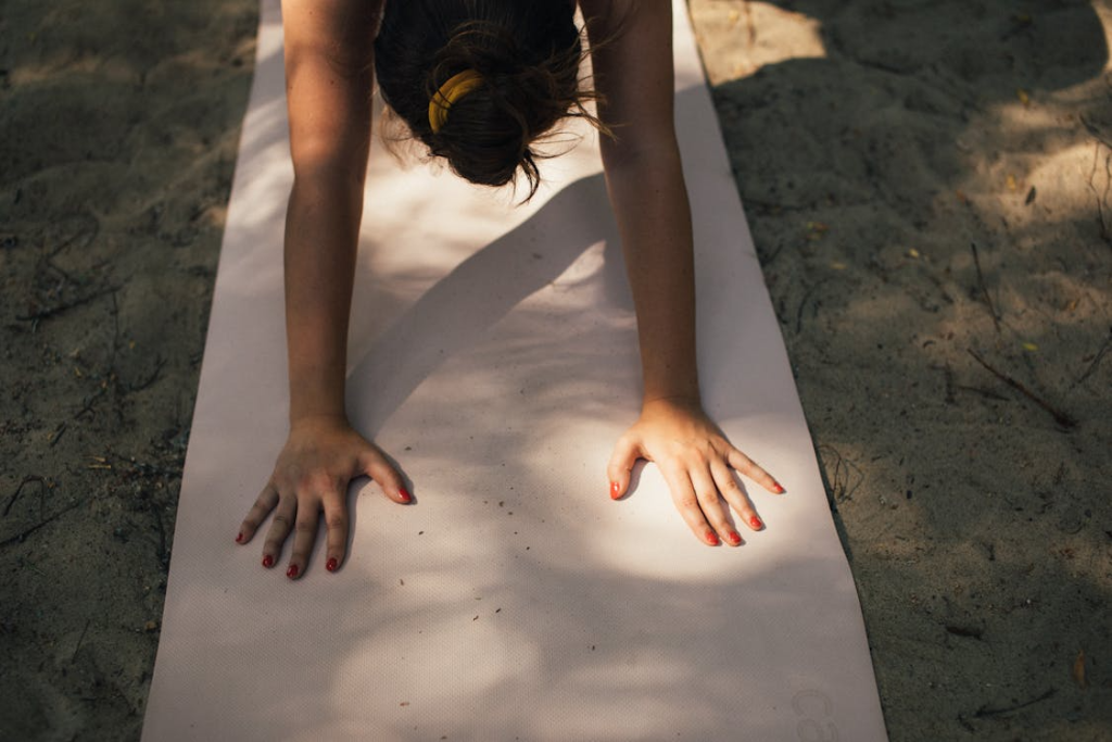 A Woman Planking on Gray Yoga Mat
