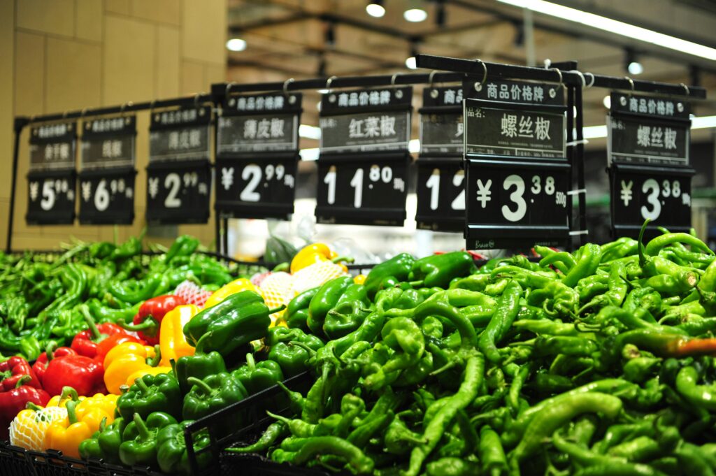 Colorful Bell Peppers Display in Chinese Market
