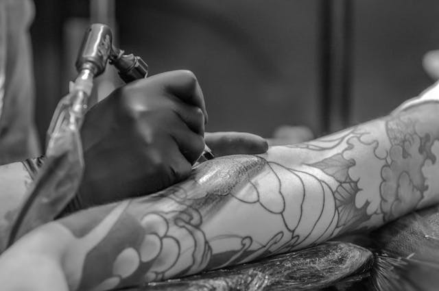 person being tattoed