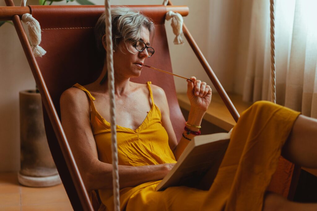 Elderly Woman Reading a Book 