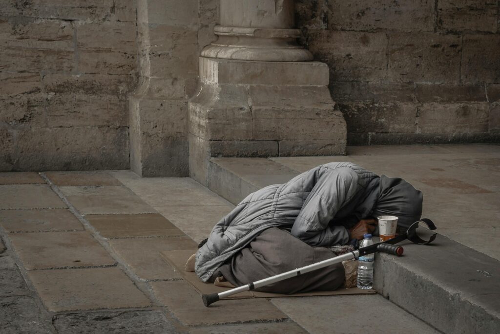 A Beggar Lying on the Floor
