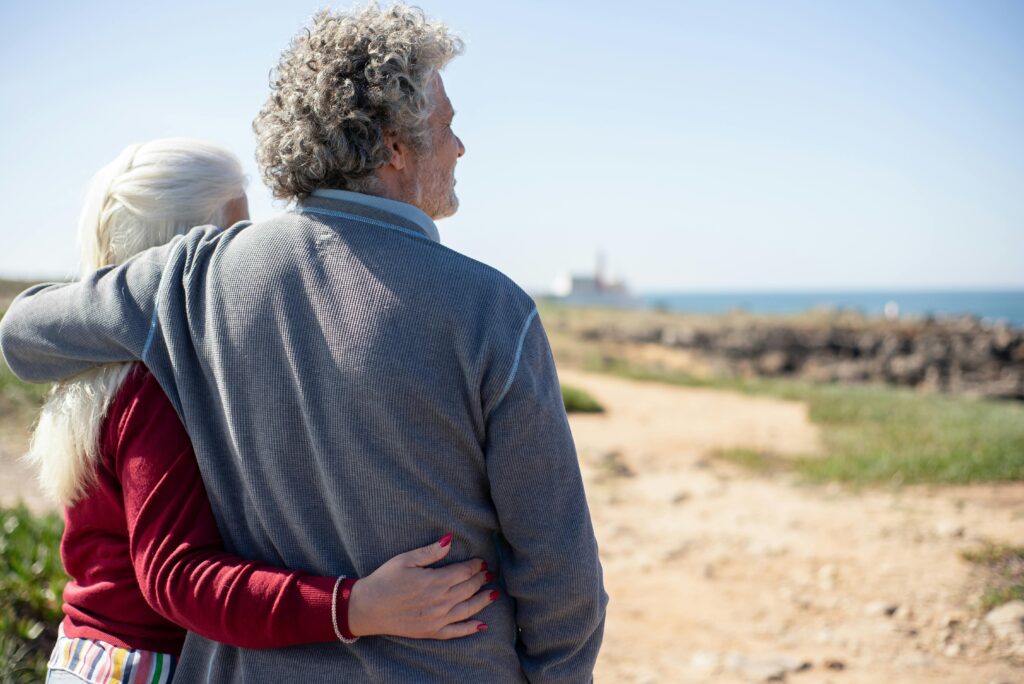 elderly couple at sea side