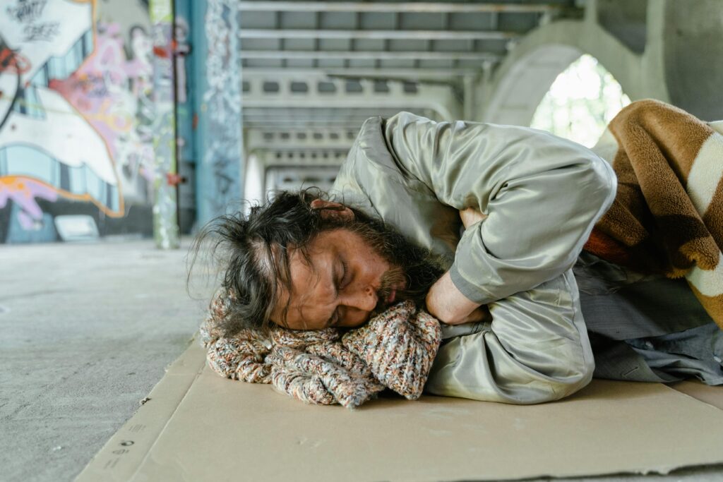 Dirty Man Sleeping on the Floor
