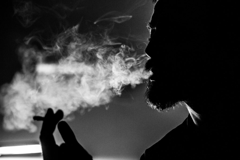 Man Holding Cigarette