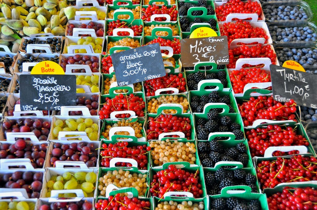 Stack of Fruits With Signage
