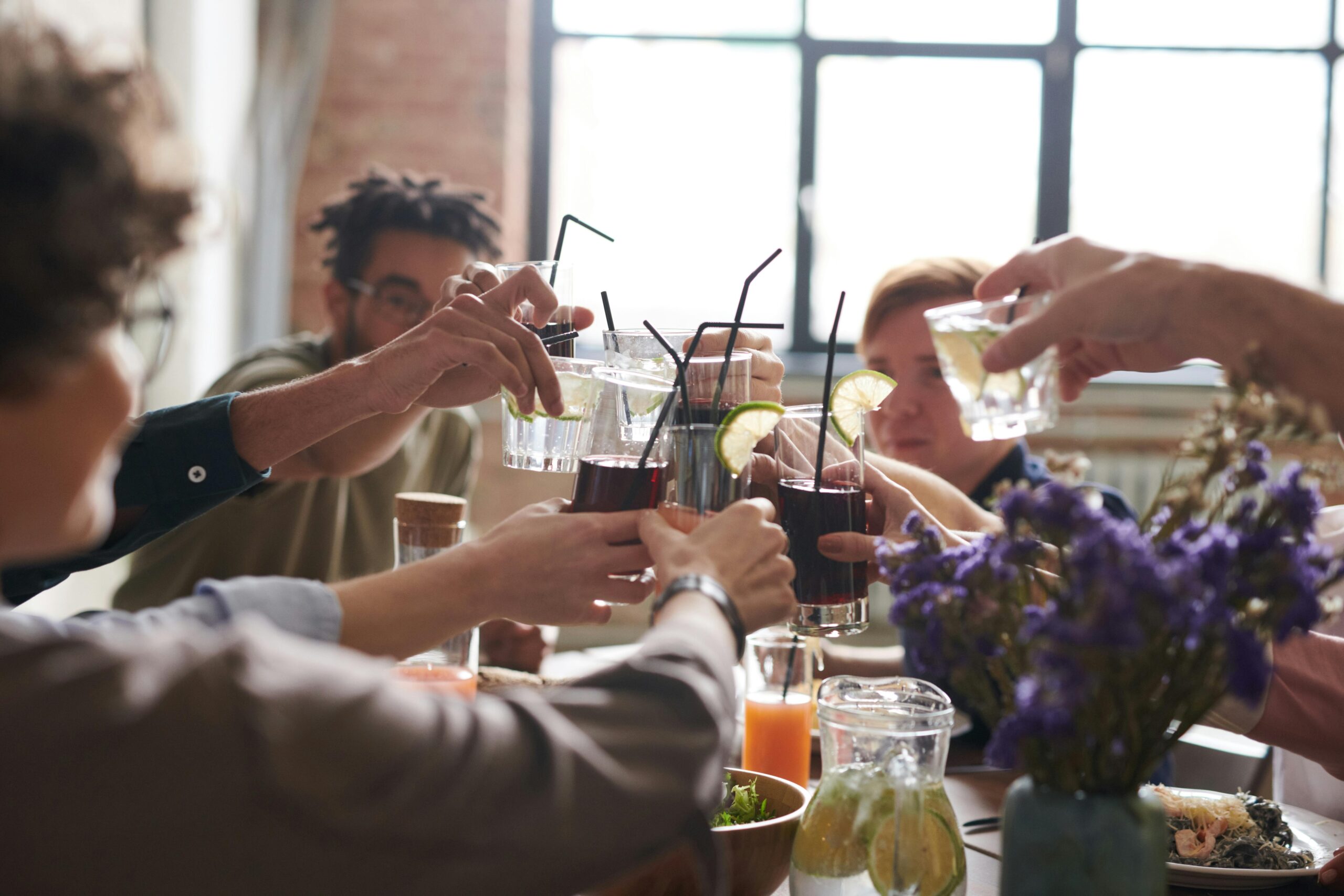 Group of People Drinking Indoors