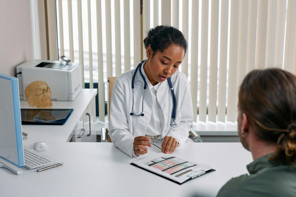 a doctor and man during consultation