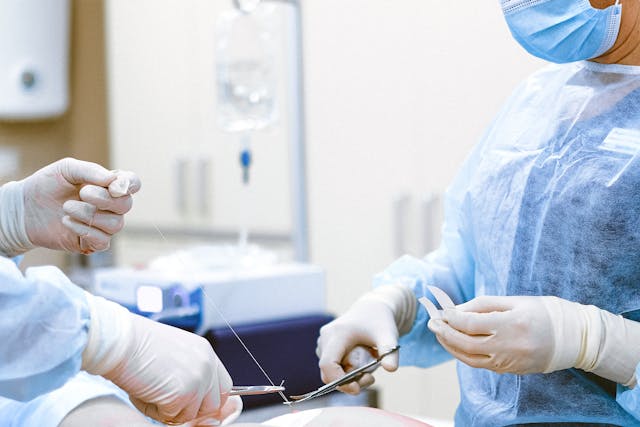 doctors performing surgery