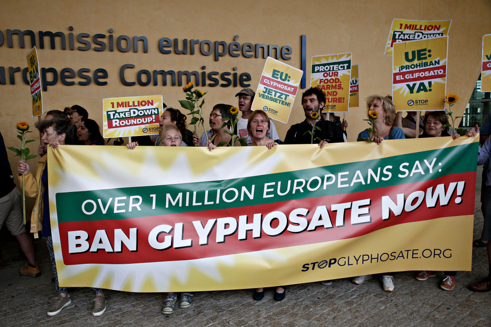 Activists take part in a protest against Biotechnology giant Monsanto, outside the European Commission headquarters in Brussels, Belgium on Jul. 19, 2017.