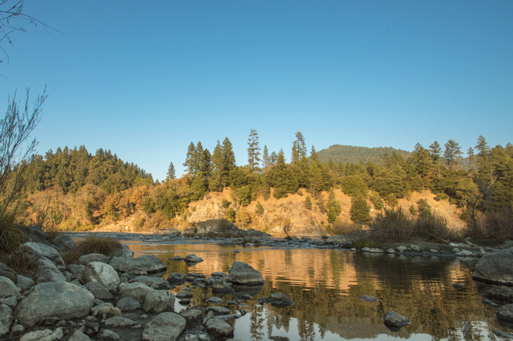 Trinity River flows through the native lands of the Hupa, Yurok, and Karuk peoples of North America.