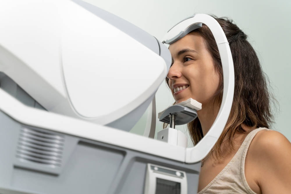 Girl getting an eye checkup with a tonometer