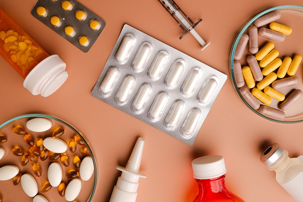pharmaceutical in various dosage forms on a beige.  the diversity of medication forms and the for healthcare and medicine products.