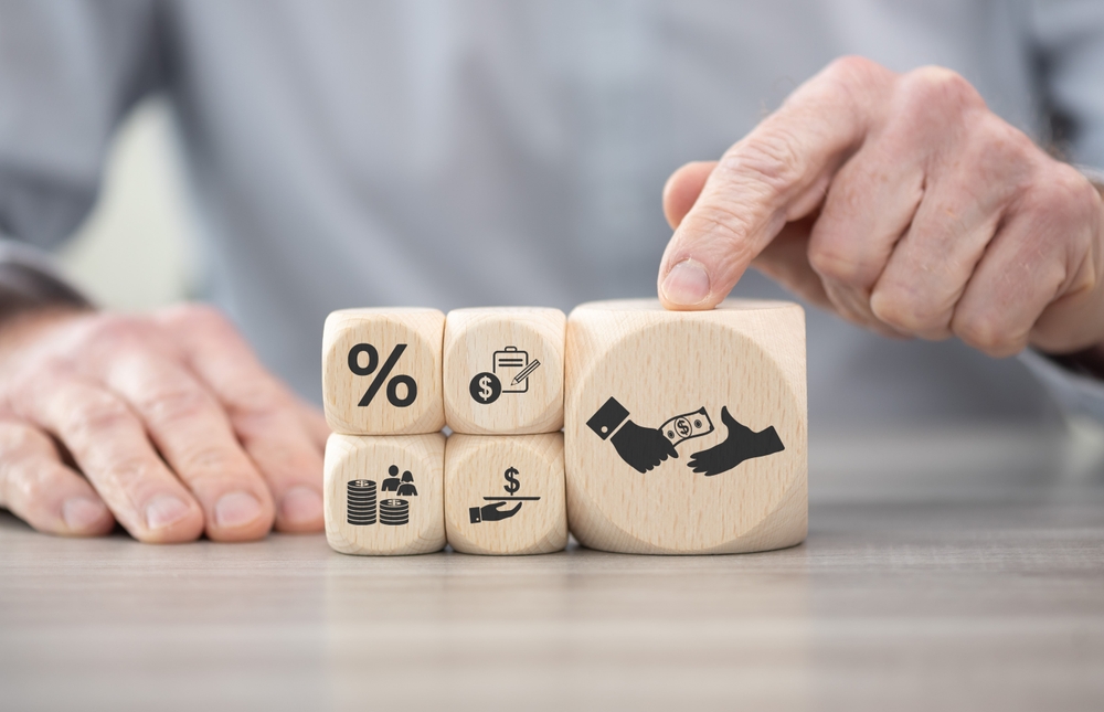 Wooden blocks with symbol of personal loan concept