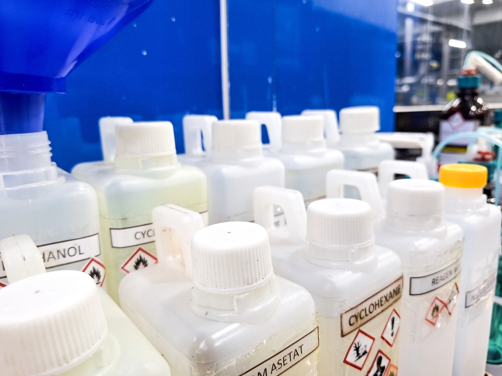 Jerry cans contain waste of dangerous chemical solutions, Hazardous and Toxic Materials.