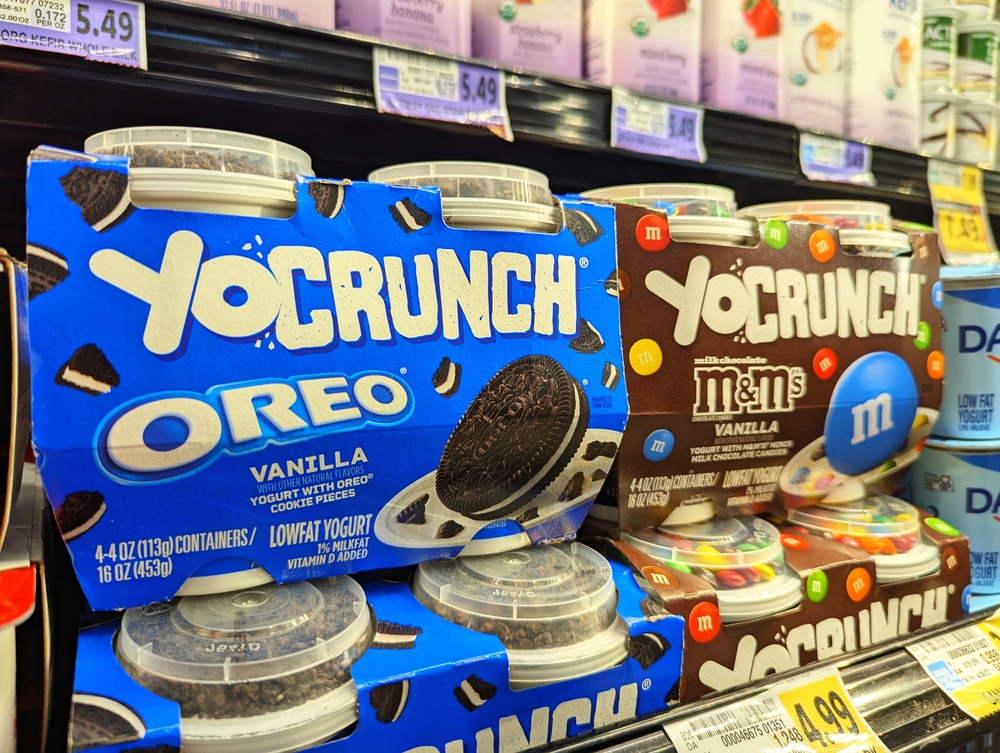 Cary, North Carolina - April 26 2025: YoCrunch Yogurt with Toppings for all Snacking Occasions on Shelf at Harris Teeter Grocery Food Store

