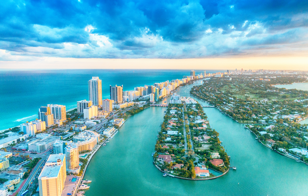 Miami Beach, wonderful aerial view of buildings, river and vegetation.
