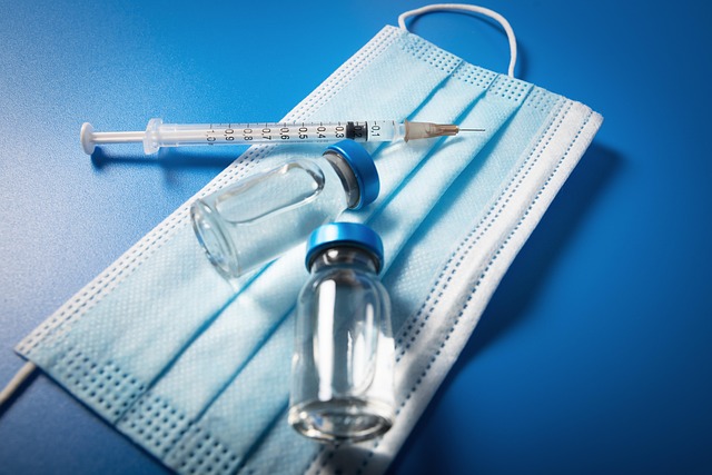 syringe, mask, and vaccine