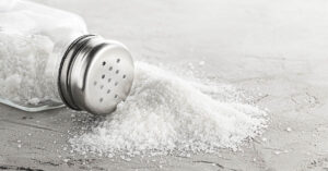 Kidney Stones and Your Diet: 10 Foods to Watch and 10 to Welcome salt shaker tipped on its side
