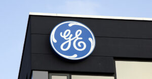 GE Appliances Shifts Washing Machine Production From China to Kentucky With $490M Investment General Electric logo on the outside of a building