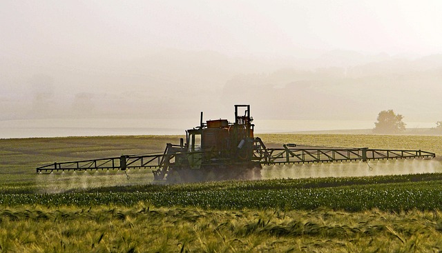 farmer spraying crops