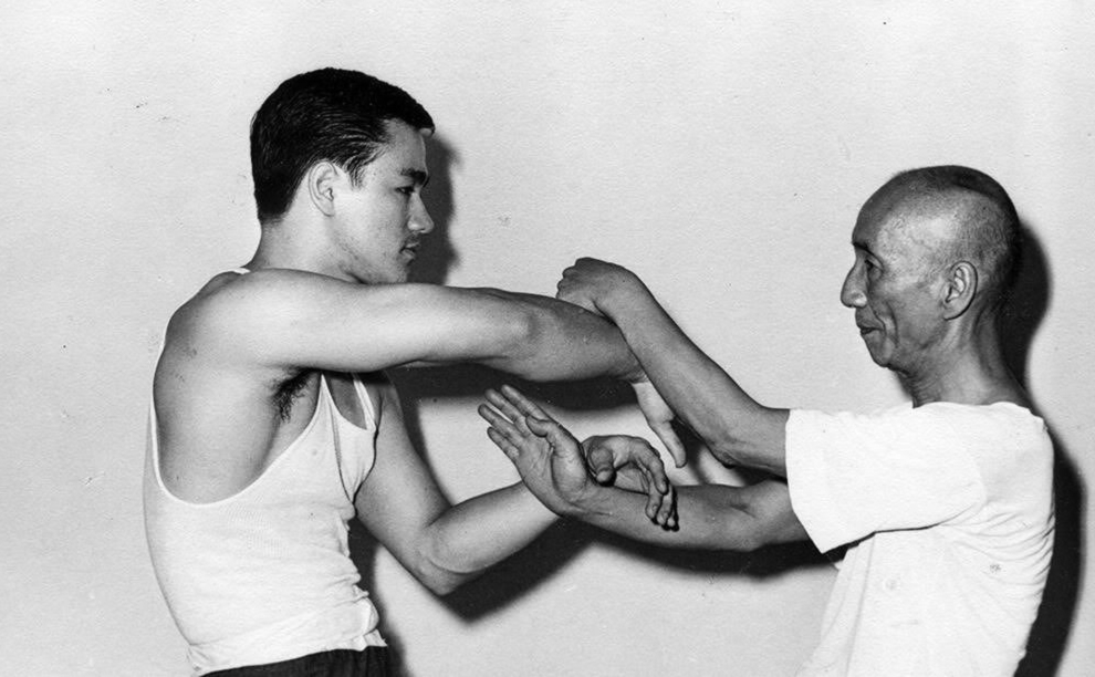 Bruce Lee and Grandmaster Ip Man practicing Wing Tsun sticky hands