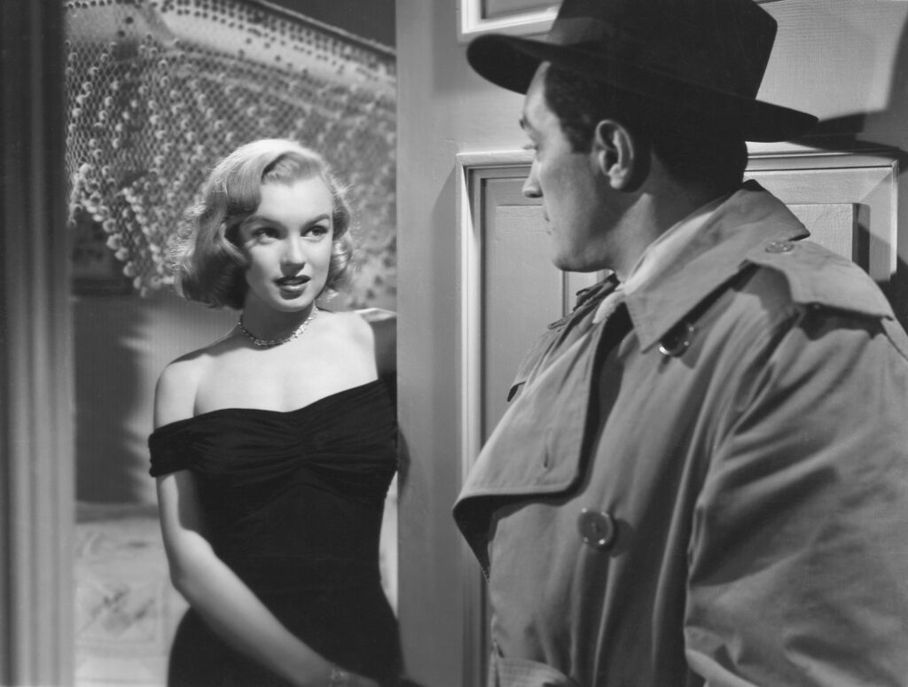 Marilyn Monroe in a publicity photograph published in TV-Radio Mirror magazine, May 1961. The photo is associated with her 1950 film "The Asphalt Jungle."