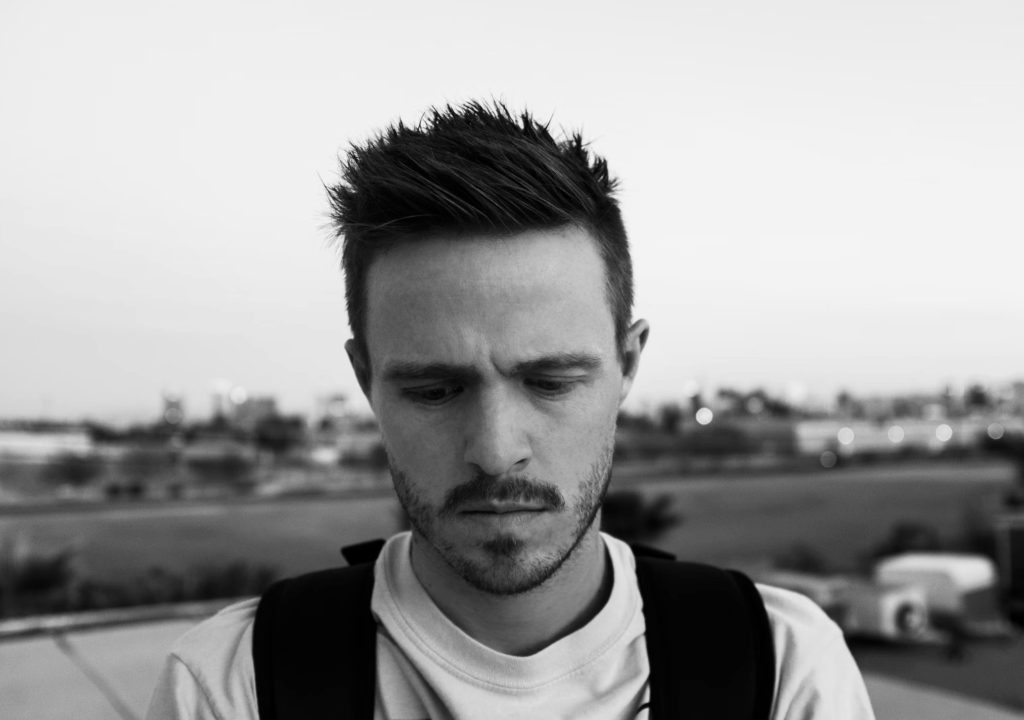 greyscale photo of man