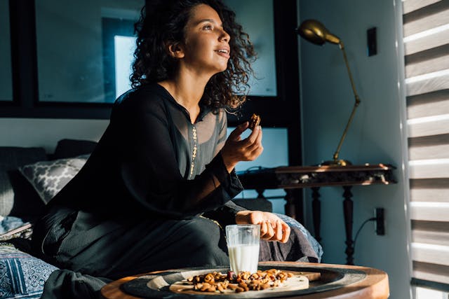 plate of dates and walnuts