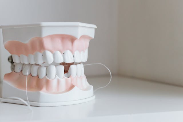 false teeth with floss