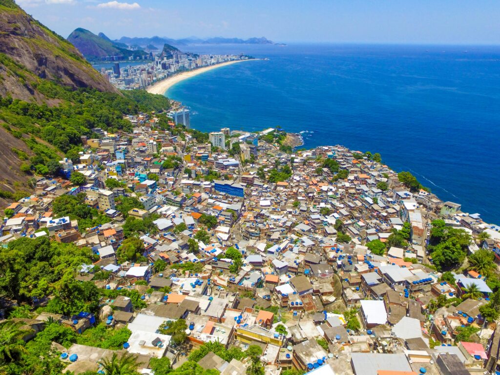 Aerial shot of city buildings near blue water body