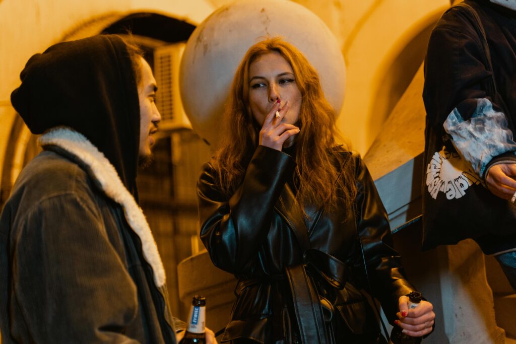 woman smoking and drinking