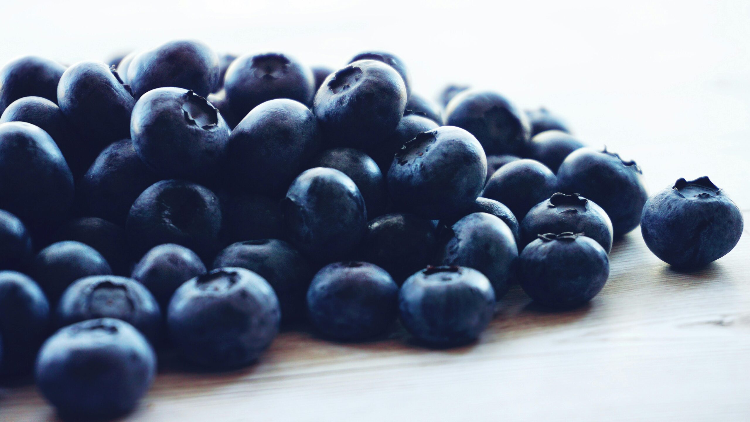 blueberries on a wooden table