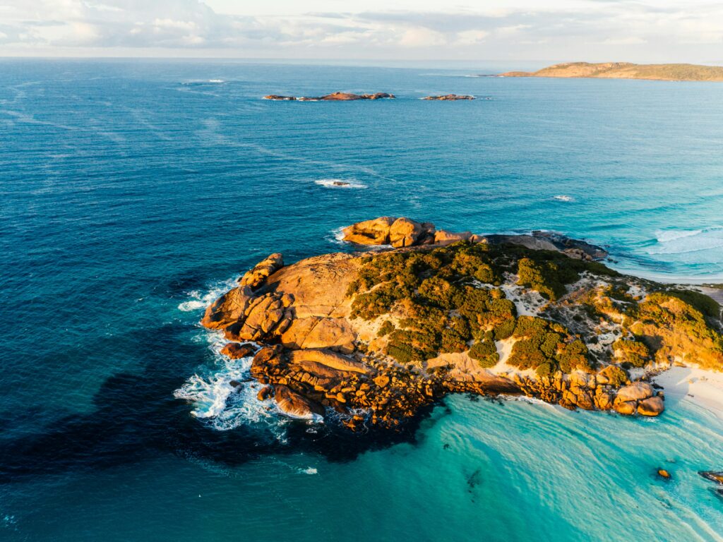 Brown rock formations in the sea