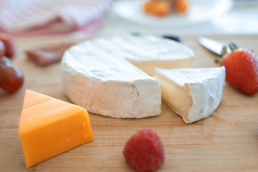 Sliced Cheese on Brown Wooden Table
