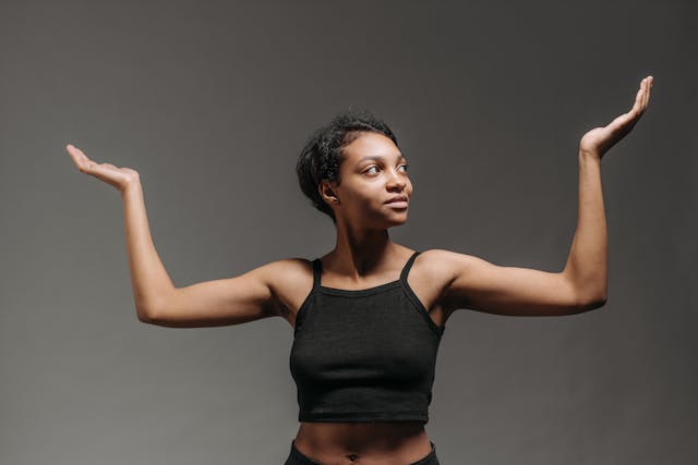 woman with arms raised