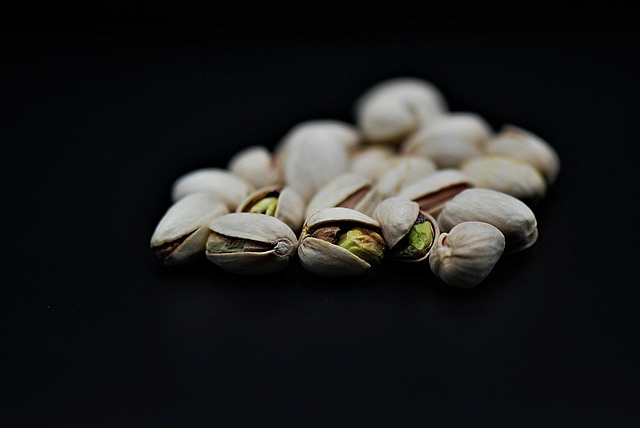 pistachios with black background