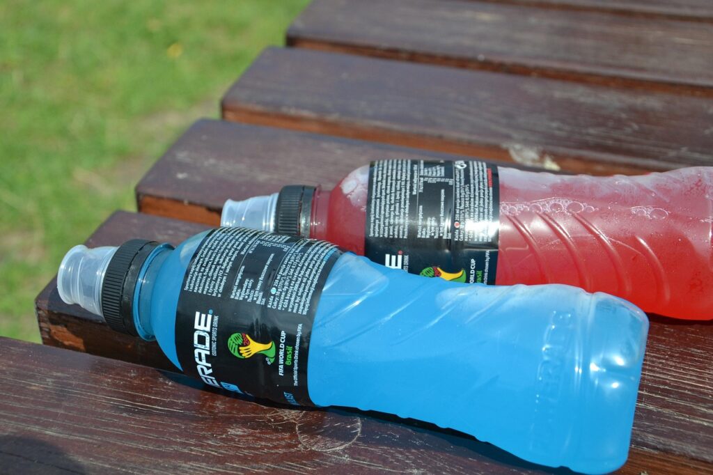 Powerade electrolyte drinks laying on table