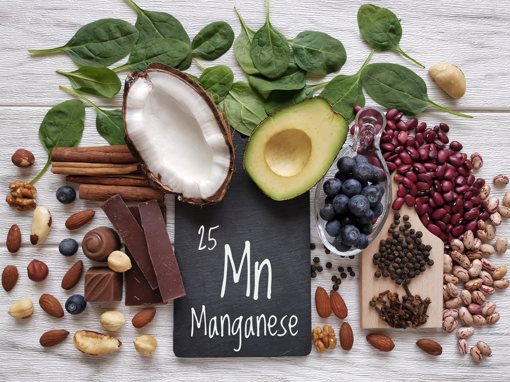 Foods rich in manganese with the chemical symbol Mn for the chemical element manganese. Natural sources of manganese: avocado, cloves, cinnamon, black pepper, spinach, dark chocolate, beans, blueberry
