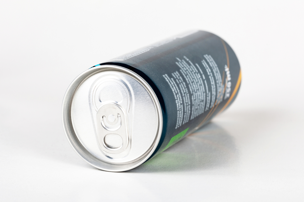 Krakow, Małopolska, Poland - April 2021: Home Drink, simple carbonated energy drink small 250 ml can, single laying object. Caffeinated energy drinks, soft drinks concept, beverage can, nobody
