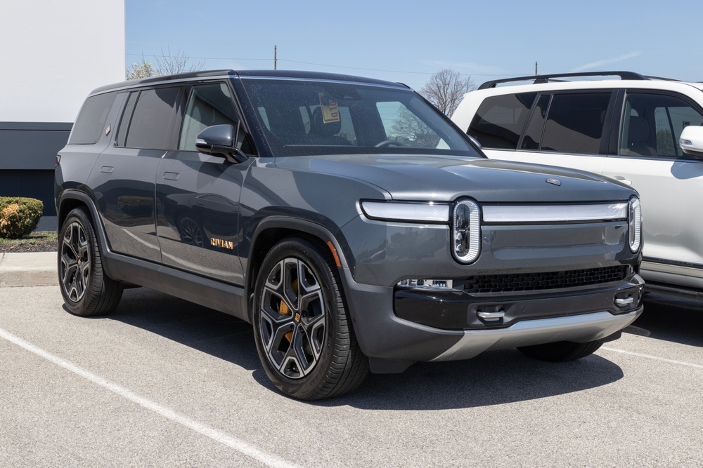 Indianapolis - Circa April 2023: Rivian R1S EV Electric Vehicle display at a dealership. Rivian offers the R1S in Adventure and Launch models.