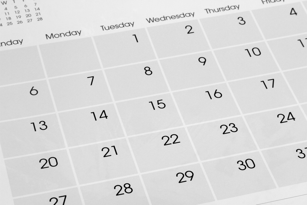 Close-up of numbers on calendar page