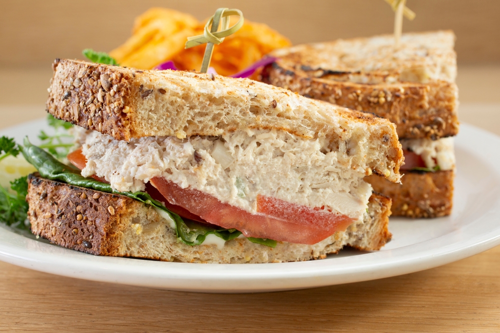A closeup view of a tuna salad sandwich.