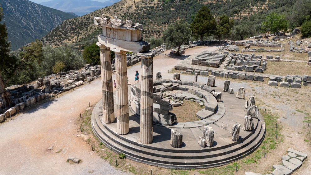 Aerial bird's eye view photo taken by drone of archaeological site of ancient Delphi, site of temple of Apollo and the Oracle, Voiotia, Greece