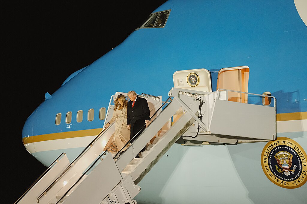 Donald Trump and Melania Trump descending from Air Force One after arriving in Britain for Trump's second state visit.