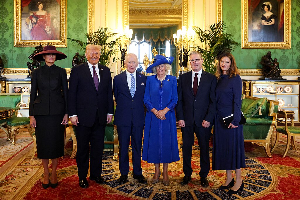 Trump and Melania Trump meet King Charles III, Queen Camilla, Prime Minister Keir Starmer and his wife Victoria in the ornate Green Drawing Room at Windsor Castle during the state visit.
