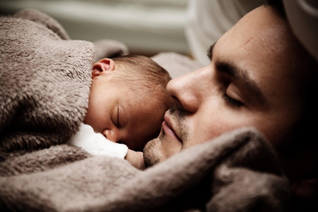 father with newborn baby