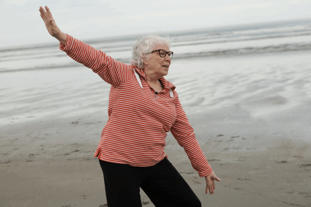 woman exercising on beach